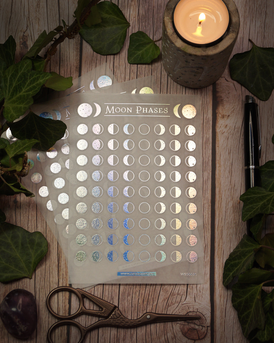 A6 sheet of Moon Phase Washi Stickers featuring 76 small, 8mm holo foil stickers on delicate, semi-transparent washi paper. Designed for journaling, planners, and moon rituals.