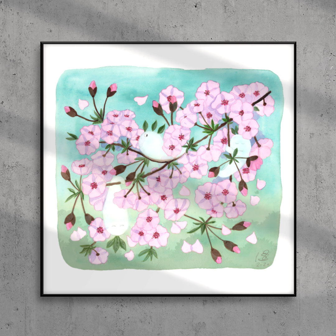Fine art print of a watercolor painting with soft pink cherry blossoms and cute Japanese tree spirits (Kodama), in gentle spring colors. High-quality Giclée print on textured paper with white border – perfect for nursery decor or as a baby gift.