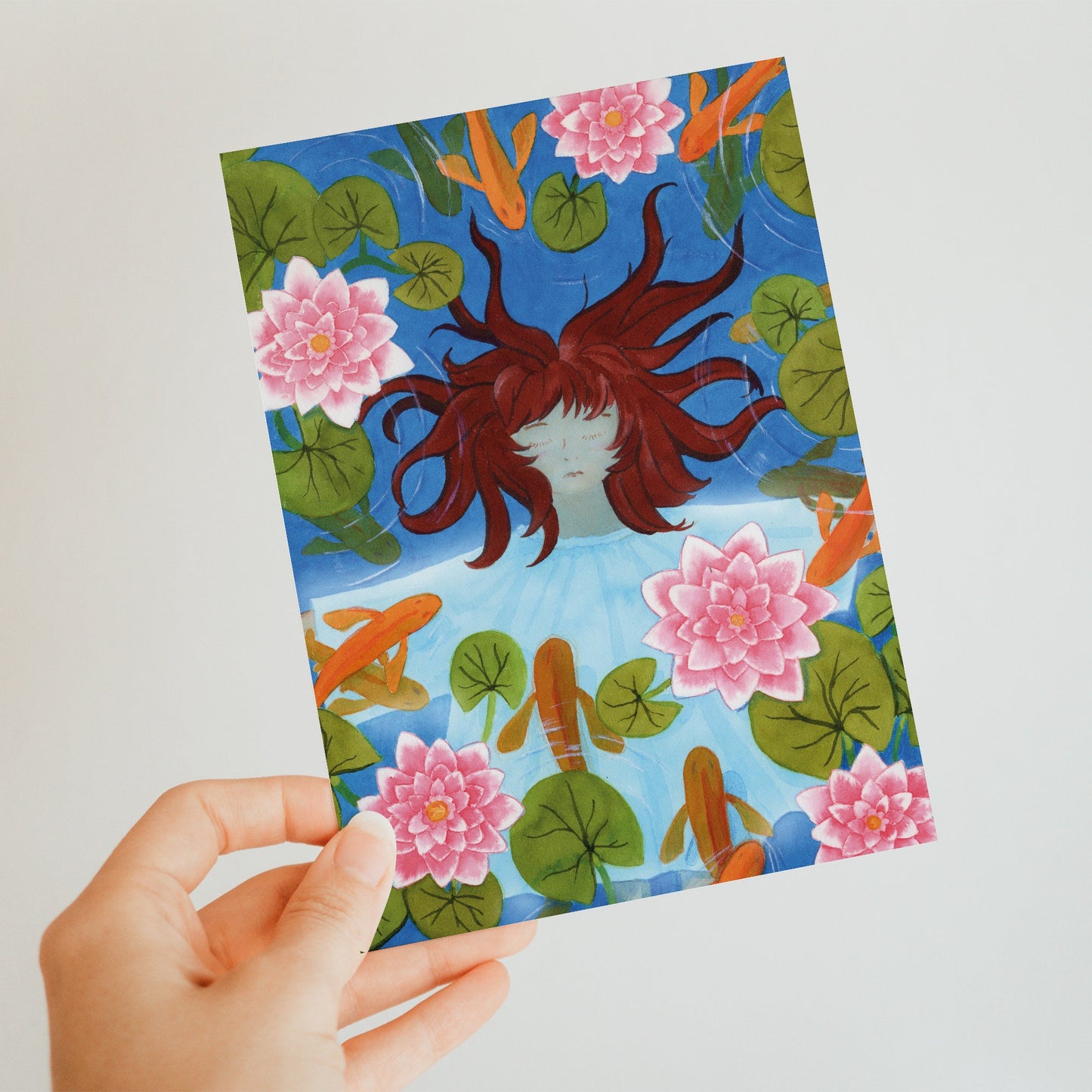 Postcard 'Waterlily Girl' with water lilies and goldfish